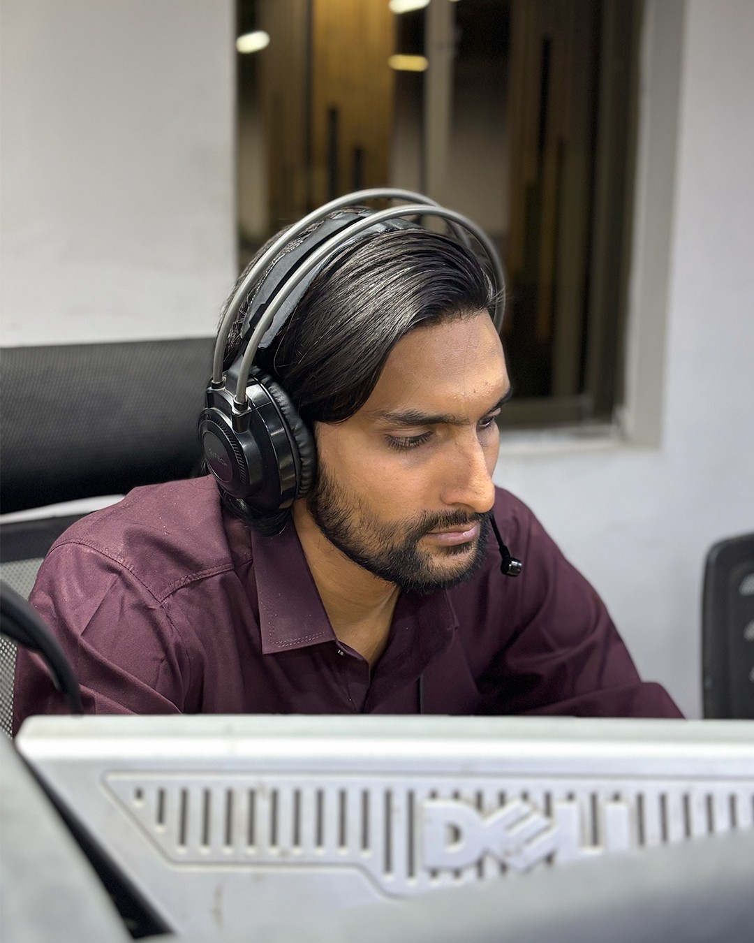 A JSons Communications closer on a call